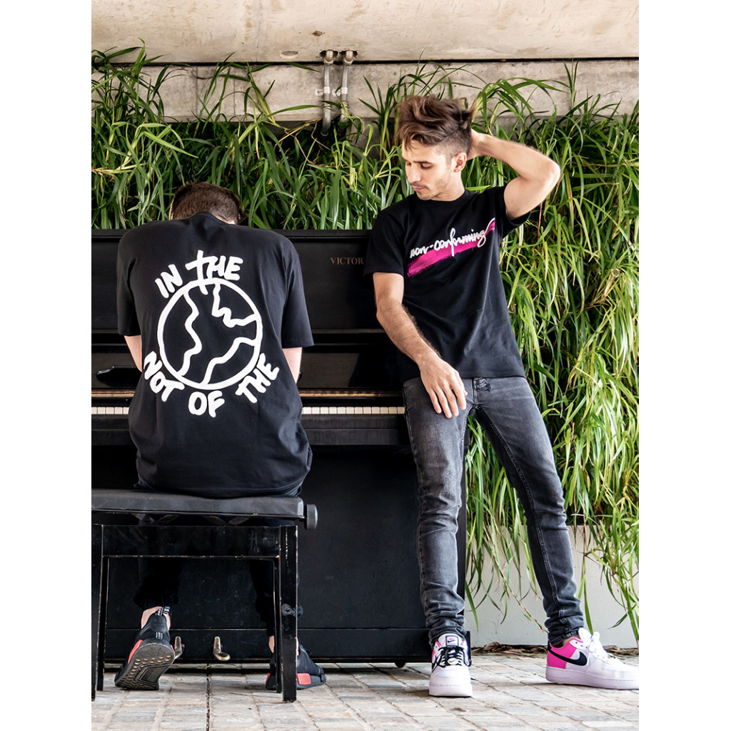 NOT OF THE WORLD BRUSH on Black T-Shirt